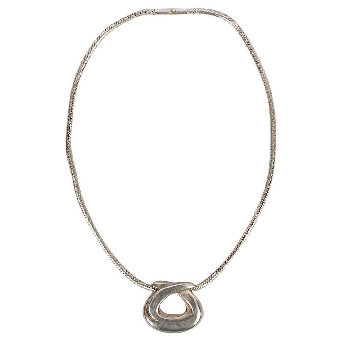 Collana con ciondolo Hermès in argento in vendita
