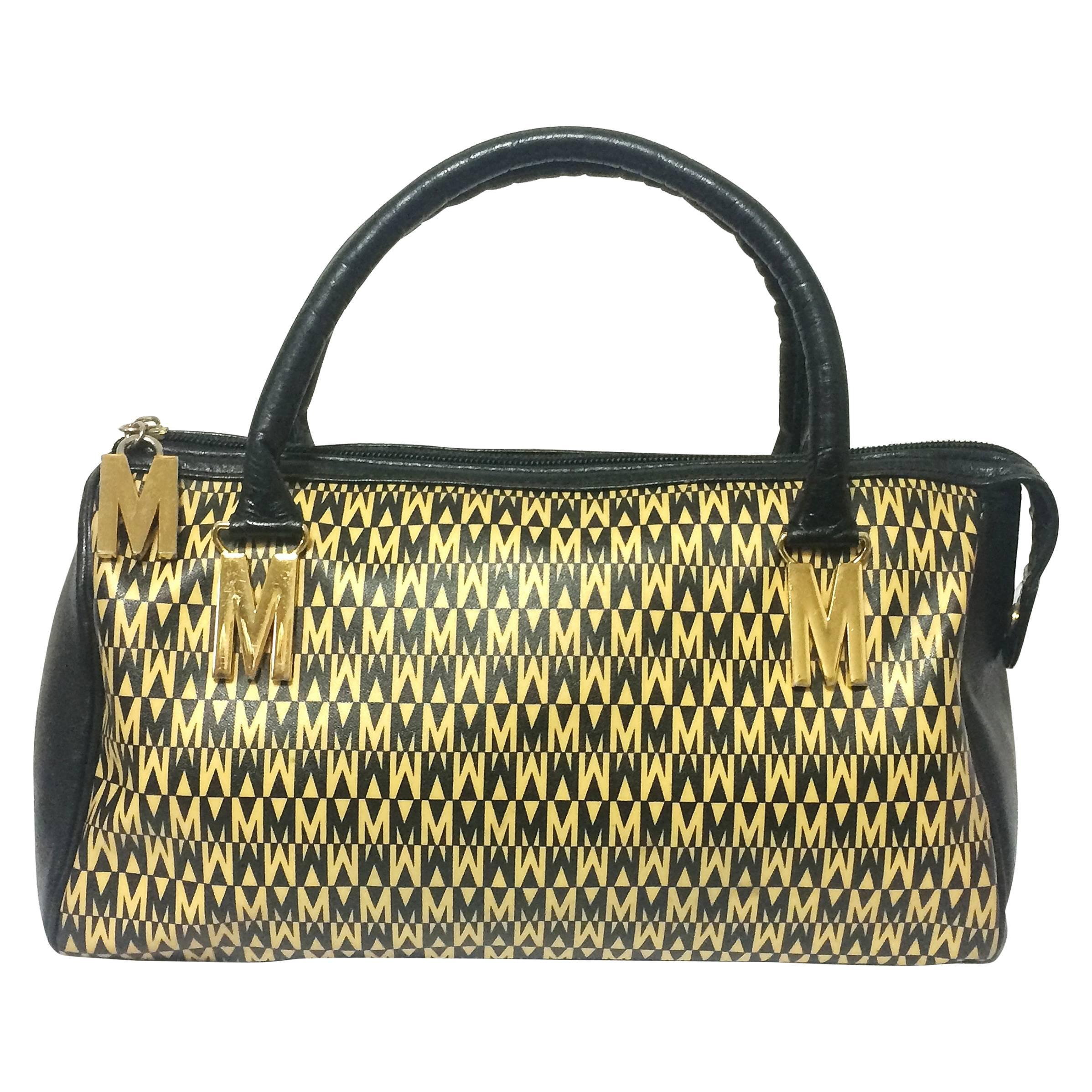 Vintage MOSCHINO black and ivory beige logo M print handbag, mini duffle bag. For Sale