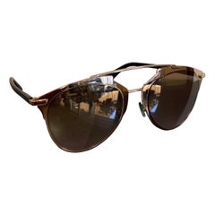 Christian Dior glasses reflects Mirror aviator model.