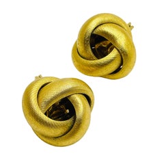 MONET signed vintage gold tone knot designer clip on earrings