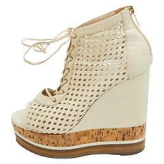 Jimmy Choo Off White, pelle traforata, stivali con zeppa in sughero taglia 37