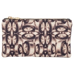 Charlotte Olympia - Pochette zippée en tissu imprimé multicolore
