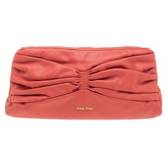 Miu Miu Coral Orange Leather Bow Kiss Lock Clutch