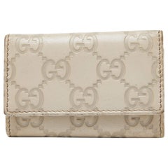 Gucci Beige Guccissima Leather Bow 6 Key Holder