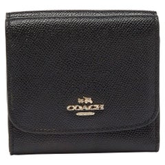 Portefeuille compact trifold en cuir noir de Coach