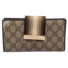 Gucci GG Supreme - Portefeuille continental vintage en toile beige