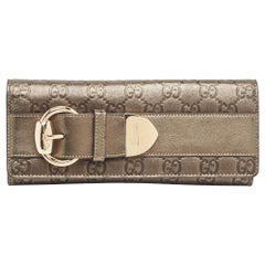 Gucci Metallic Guccissima Leather Buckle Continental Wallet