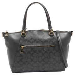 Sacoche Prairie Signature de Coach en toile enduite et cuir noir