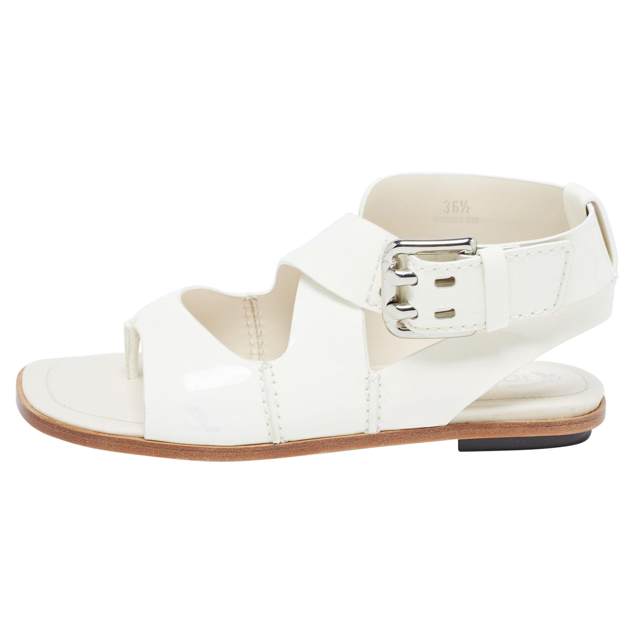 Tod's Cream Patent Leather Cross Strap Flat Sandals Size 36.5 For Sale