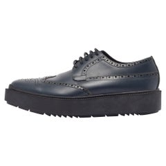 Prada Marineblaue Brogue Deby Turnschuhe aus Leder Größe 39