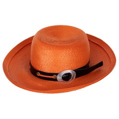 Yves Saint Laurent, chapeau en lucite verni orange à dos de paille, années 1970