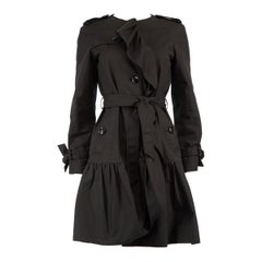 Moschino Boutique Moschino Schwarzer Trenchcoat mit Rüschenbesatz Größe XS