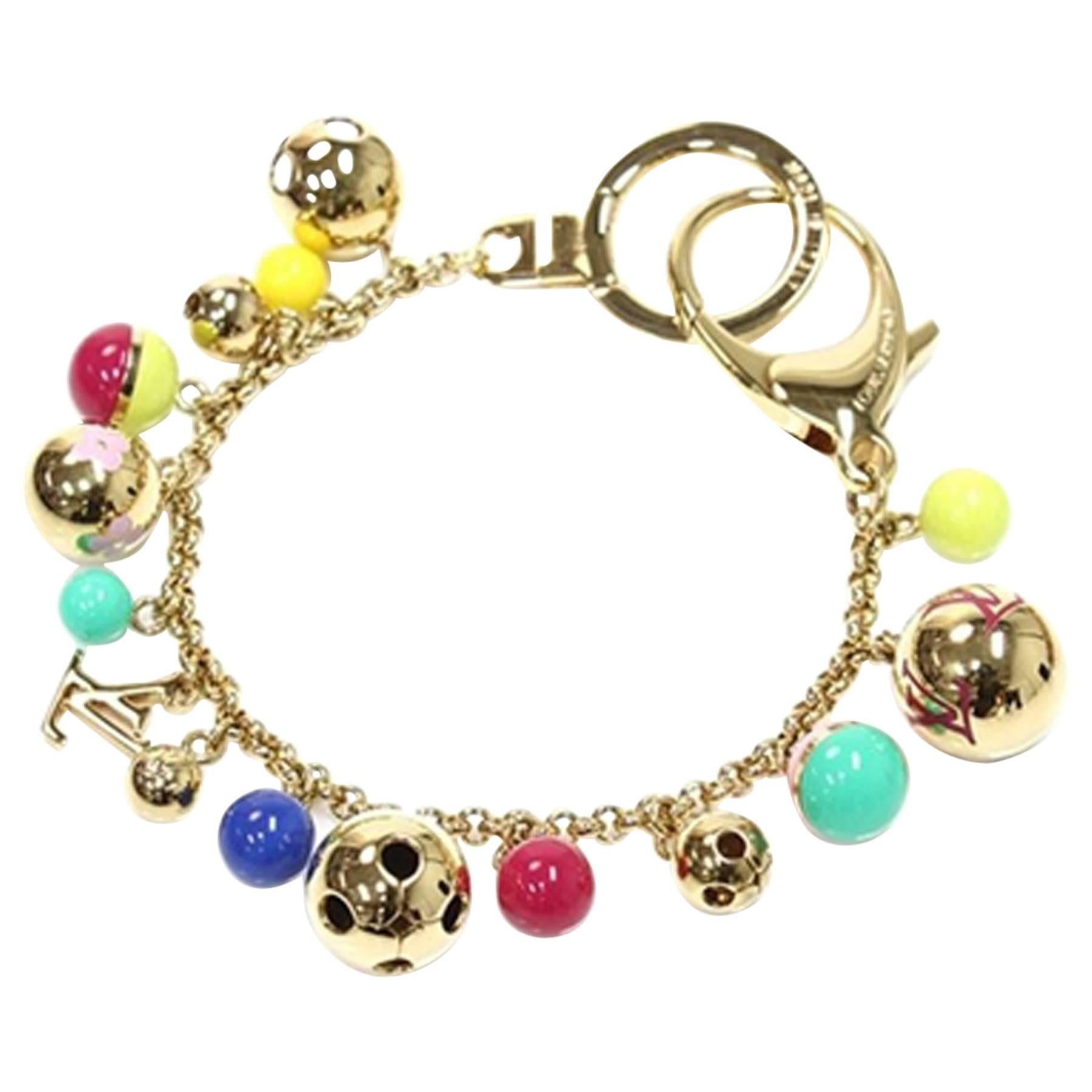 Louis Vuitton beaded bag charm - bracelet
