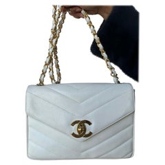 Borsa Chanel caviar chevron jumbo