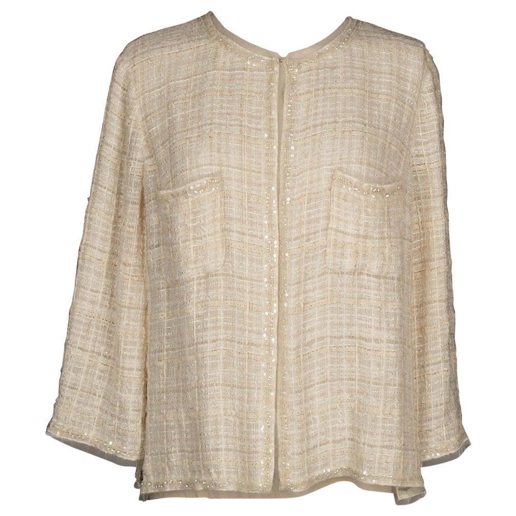 Veste Chanel en tweed ornée de sequins et de perles