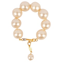 Bracelet de perles en métal doré de Chanel