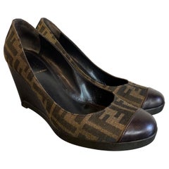 Zucca Canvas Cap Toe Wedge pumps