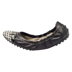 Tod's - Ballerines en cuir noir/blanc avec nœud de fixation  Taille 37.5