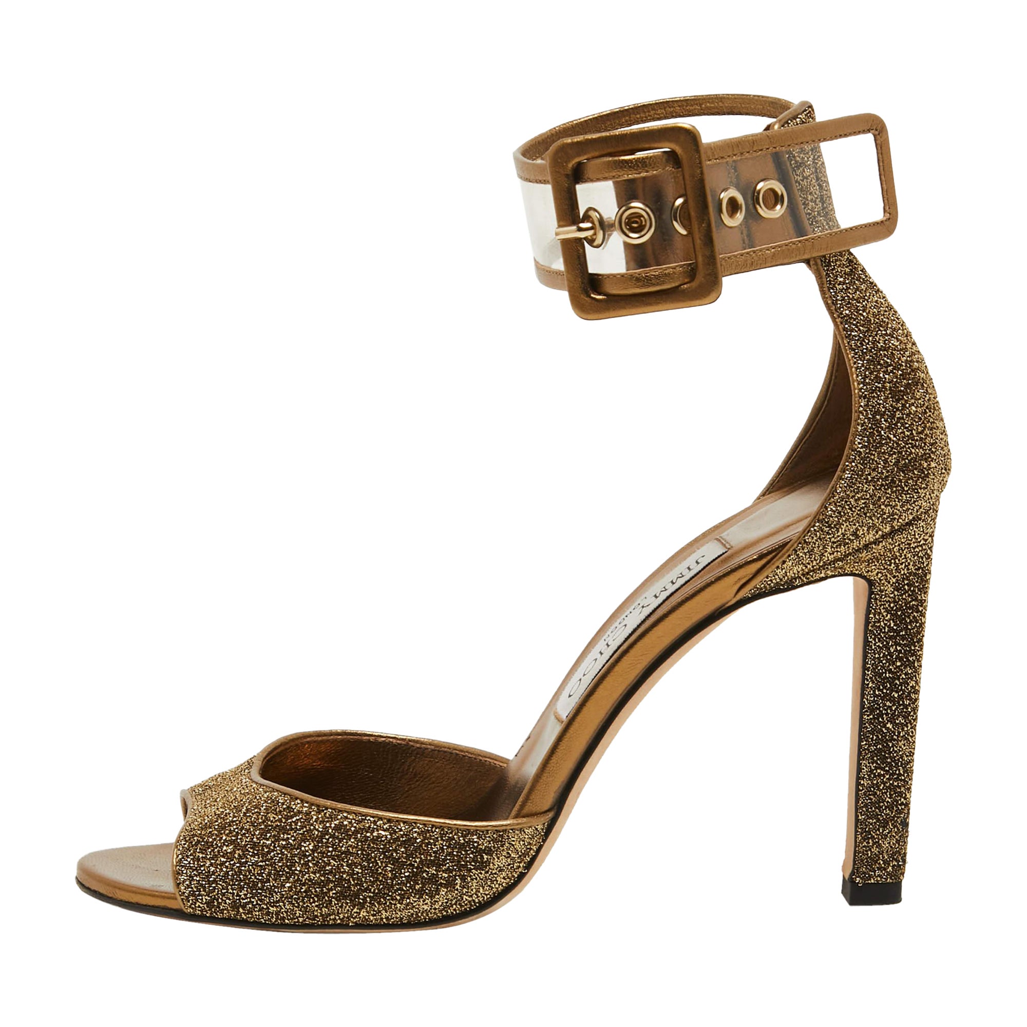 Jimmy Choo Sandalias con correa en el tobillo de tejido de lúrex metalizado y PVC moscovita Talla 37.5