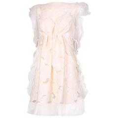 Creme Floral Design 
Organza Ruffle Trim Sleeveless Day Dress