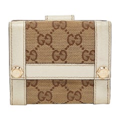 Cartera compacta Gucci Beige/Blanco roto GG de lona y piel