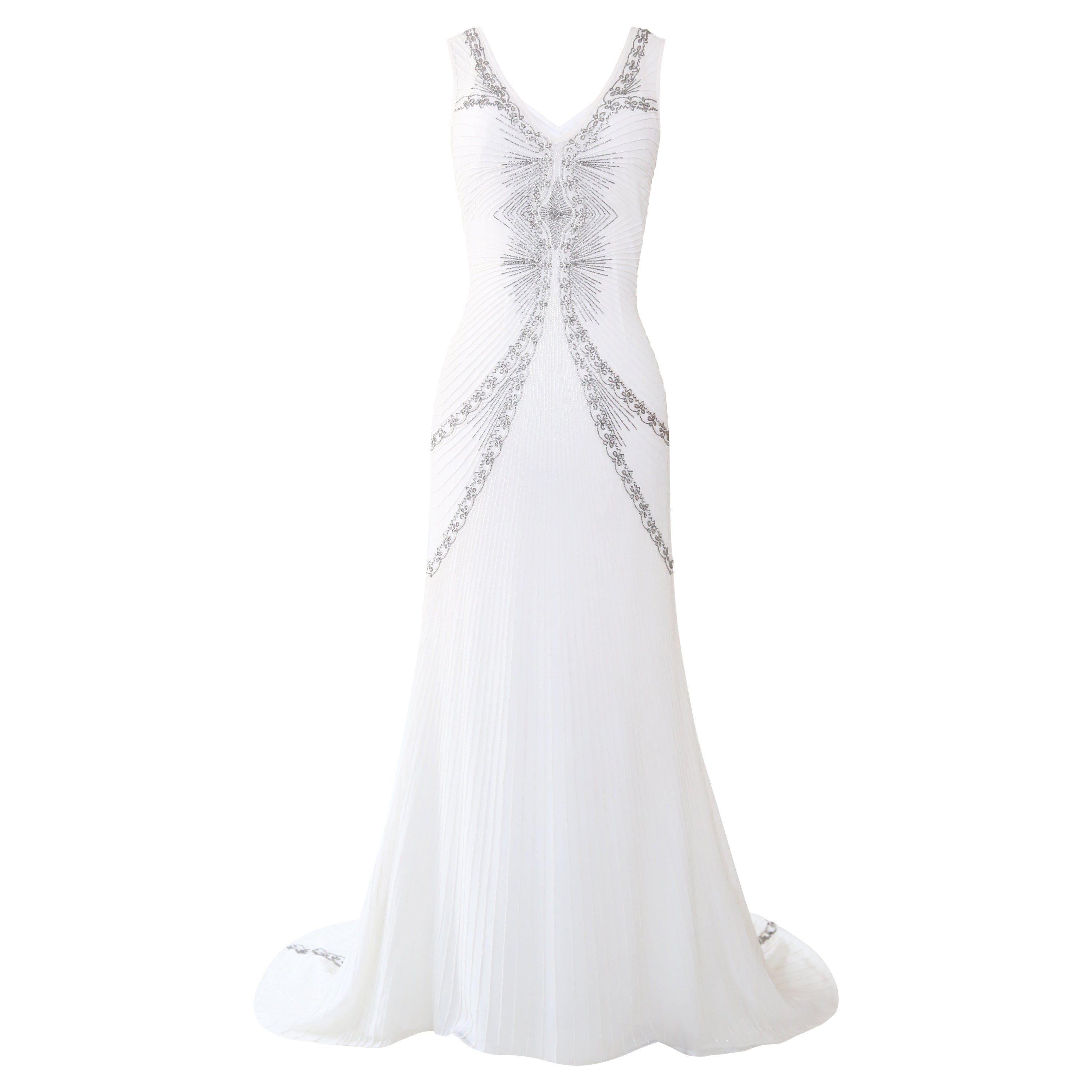 Nicole Miller vestido de novia blanco marfil plateado con pedrería y cola sin espalda en venta