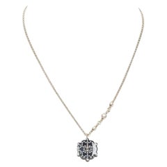 CHANEL D18 CC micro black snowflake acrylic triple pearl embellished necklace