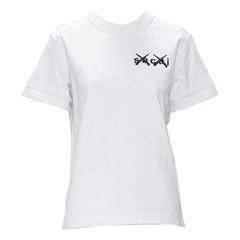 SACAI KAWS XX logo ricamato tasca bianca cotone boxy tshirt JP0 XS