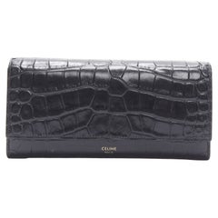 CELINE black scaled leather embossed calfskin flap front long wallet