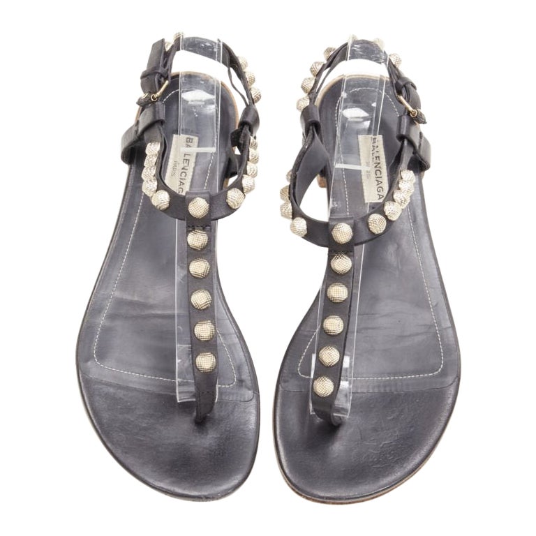 BALENCIAGA Cagole black leather gold textured  stud T-strap flat sandals EU38 For Sale