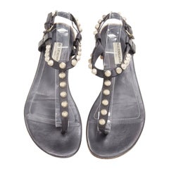 BALENCIAGA Cagole black leather gold textured  stud T-strap flat sandals EU38