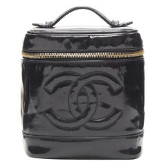 CHANEL Vintage black patent leather CC logo top handle Vanity bag
