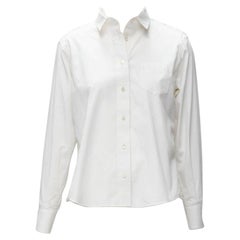 SACAI camicia svasata in cotone bianco con pizzo floreale e bottoni sul retro JP1 S