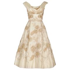 1950's Ceil Chapman Ivory Satin Rhinestone Metallic Floral Shelf-Bust Dress