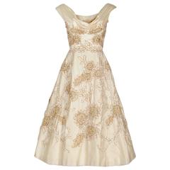 1950's Ceil Chapman Ivory Satin Rhinestone Metallic Floral Shelf-Bust Dress