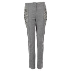 Pantaloni Blumarine in lana grigia con dettaglio floreale taglia M.