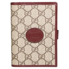 Gucci Brown Supreme GG Canvas Passport Holder