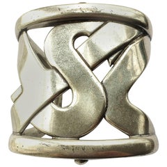 Vintage A statement logo silver plated cuff bangle, Yves Saint Laurent, France,  1980s.