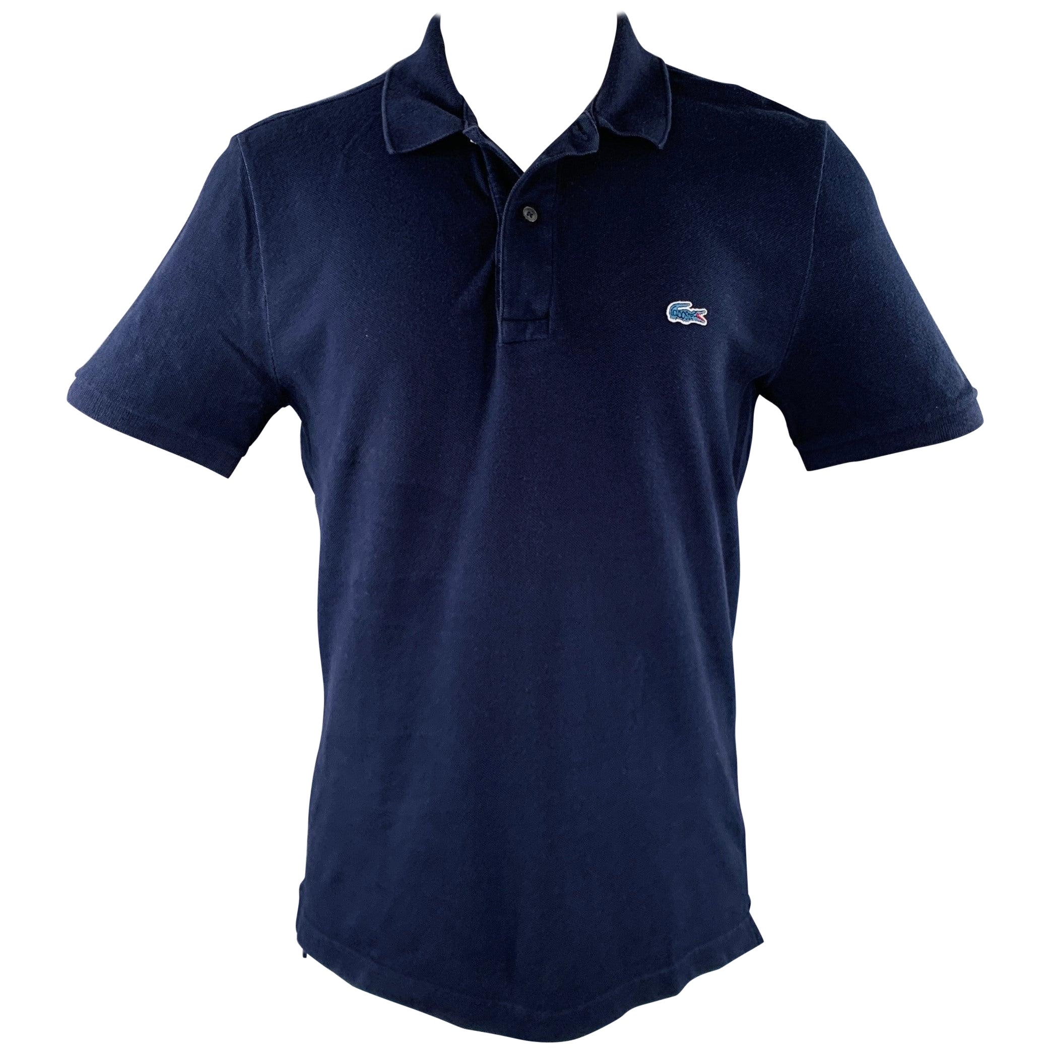 Polo con mezza abbottonatura in cotone blu LACOSTE taglia M