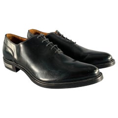 GIVENCHY Talla 9 Zapatos de cordones de piel negra con adornos metálicos