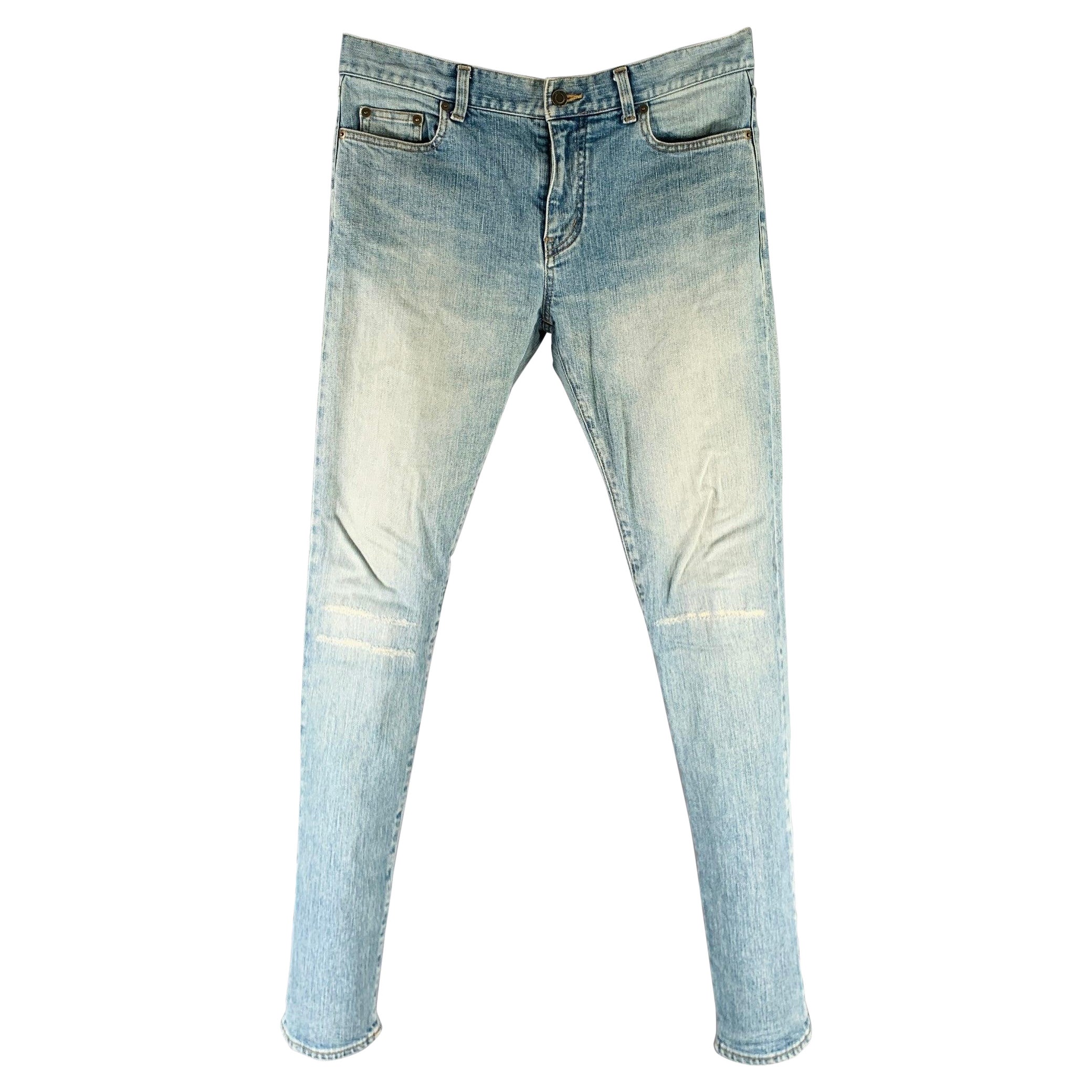SAINT LAURENT 2016 Size 31 Blue Distressed Cotton Blend Narrow Leg Jeans For Sale