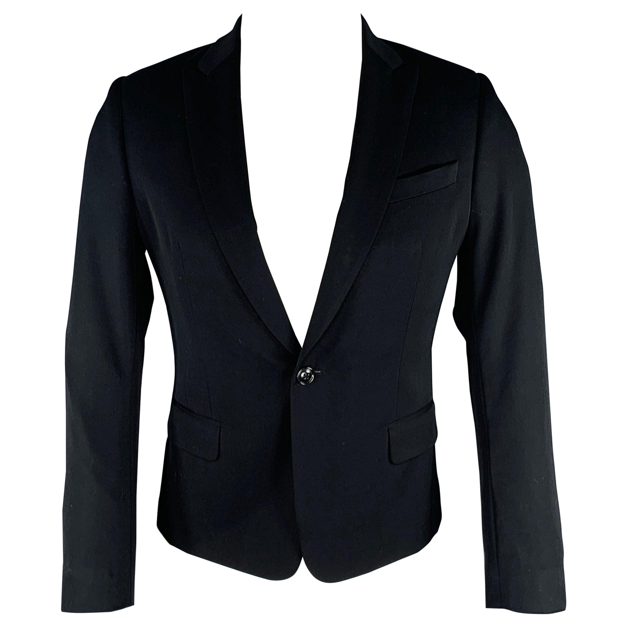 DRIES VAN NOTEN Cappotto sportivo con risvolto a punta in lana nera taglia 38