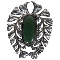 Broche de jade de las primeras artes y oficios