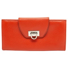 Salvatore Ferragamo Orange Leather Gancini Clasp Flap Wallet