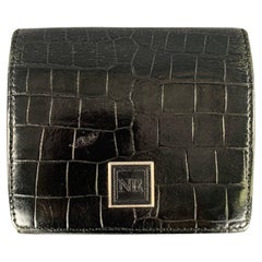 NINA RICCI Billetera Bifold de piel negra con cocodrilo en relieve