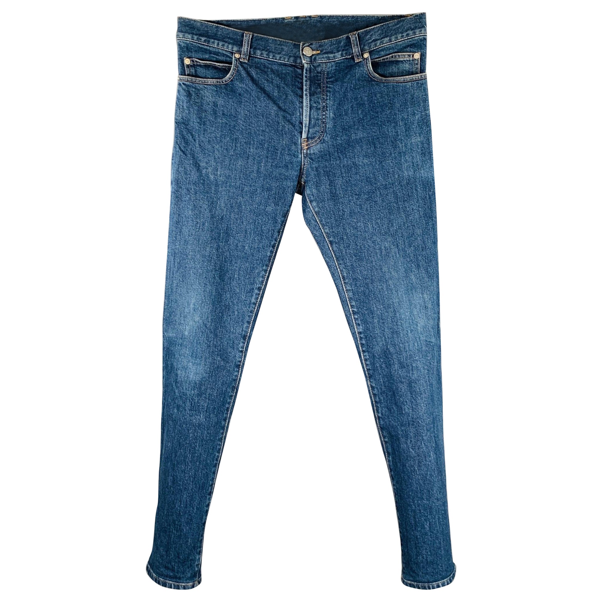 BALMAIN Größe 32 Blaue Fliegen Jeans aus Baumwollmischung mit Knopfleiste