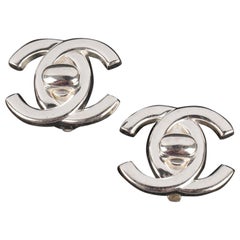 Chanel Silvery Metal Turnlock Earrings, 1997