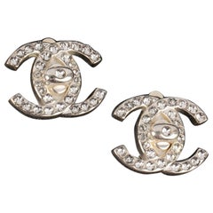 Chanel Silvery Metal Turnlock Earrings, 1996