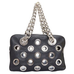 PRADA Vitello Daino Grommet Chain black leather cut out rectangle shoulder bag