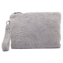 ERMENEGILDO ZEGNA grey lambskin shearling wrist strap zip clutch bag